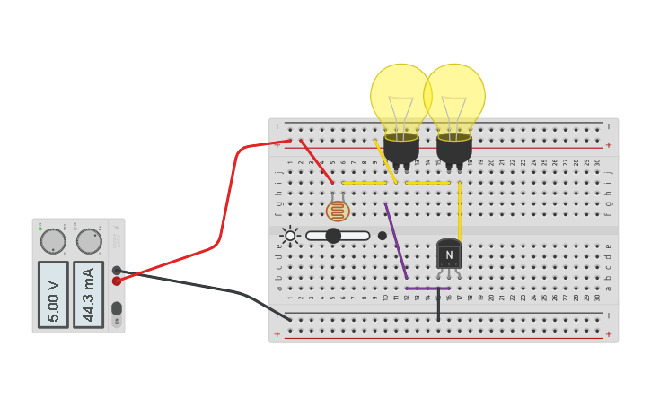 Circuit design transistor bombillas y fotoresistencia | Tinkercad